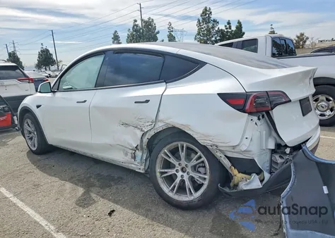 2023 Tesla Model Y from USA, damaged, VIN 7SAYGDEE3PA030132